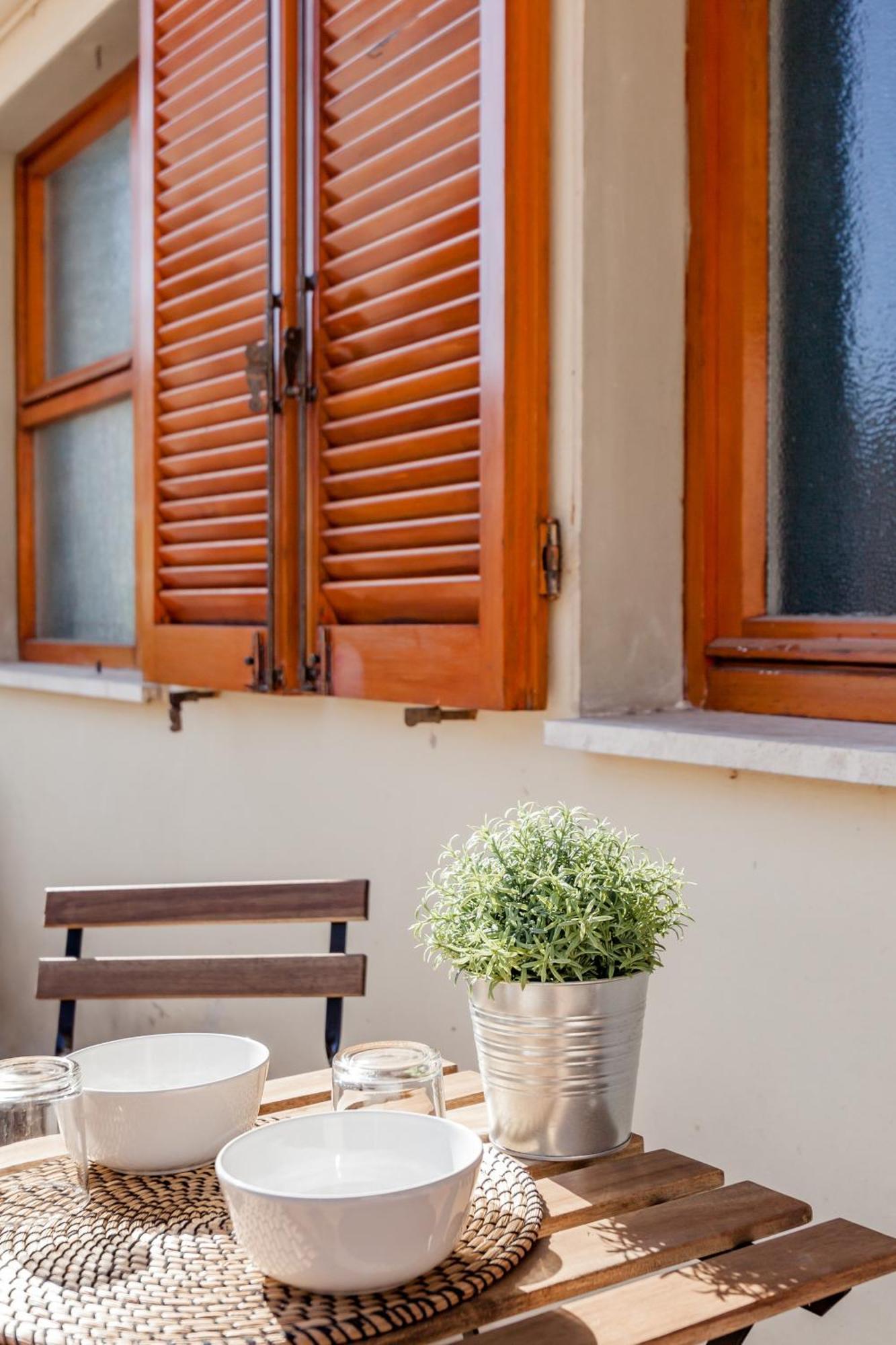 Open The Classic Wooden Shutters At A Cozy Nest Florenz